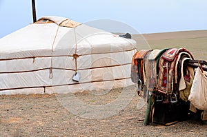 Mongolia Ã¢â¬â nomad gers (yurt) with horse saddles